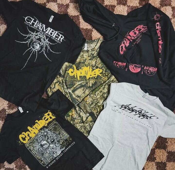 Professional merchandise collection showcasing various band merch items